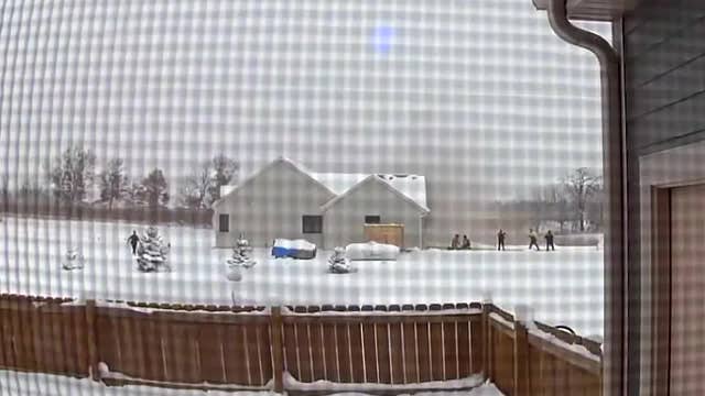 Fatal Raymond house fire new video; child rescued, woman dead