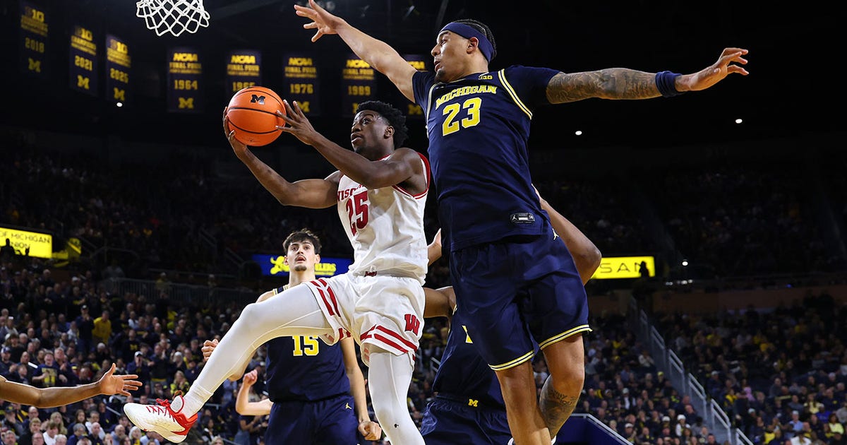 Wisconsin Badgers upset previously unbeaten Michigan on the road