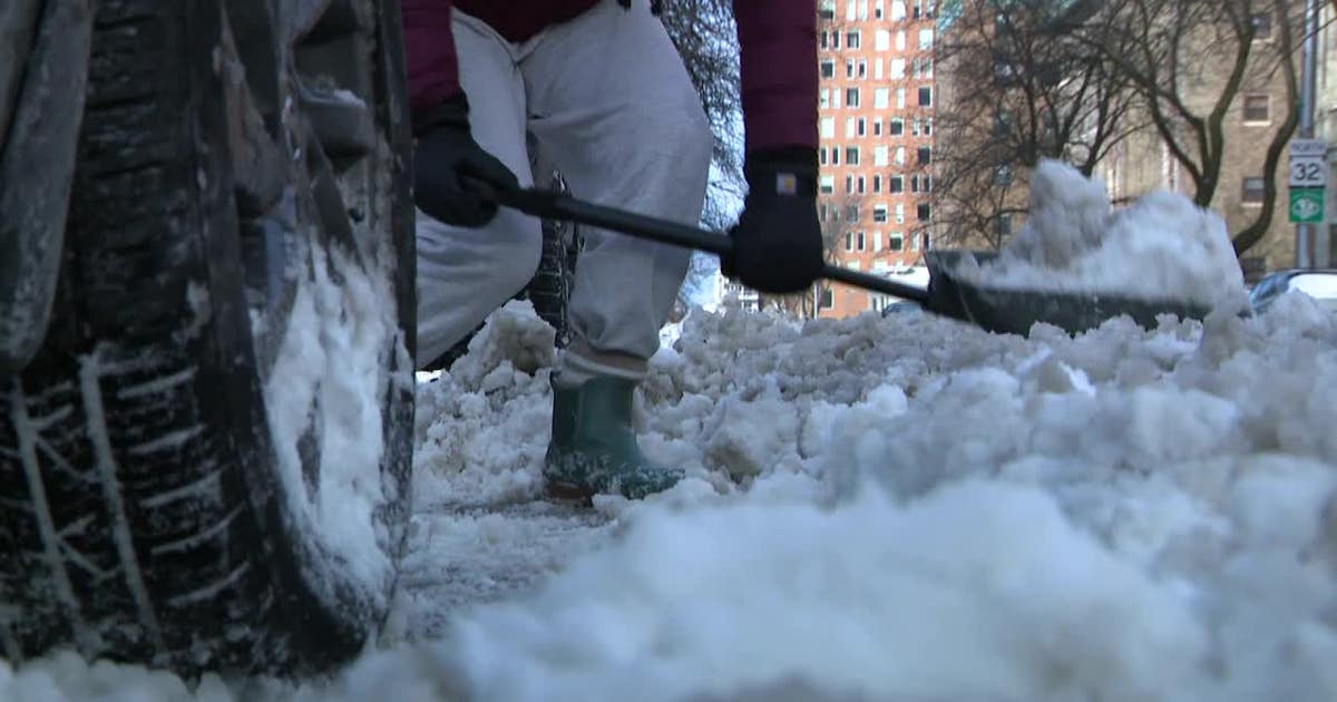 Southeastern Wisconsin residents battle snow, ice while digging out cars