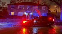 Milwaukee apartment fire; unconscious person taken to hospital