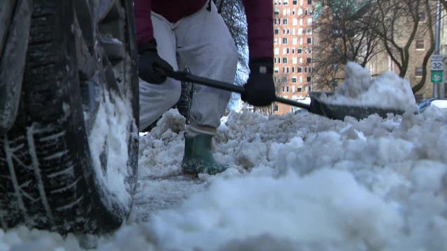 Southeastern Wisconsin residents battle snow, ice while digging out cars