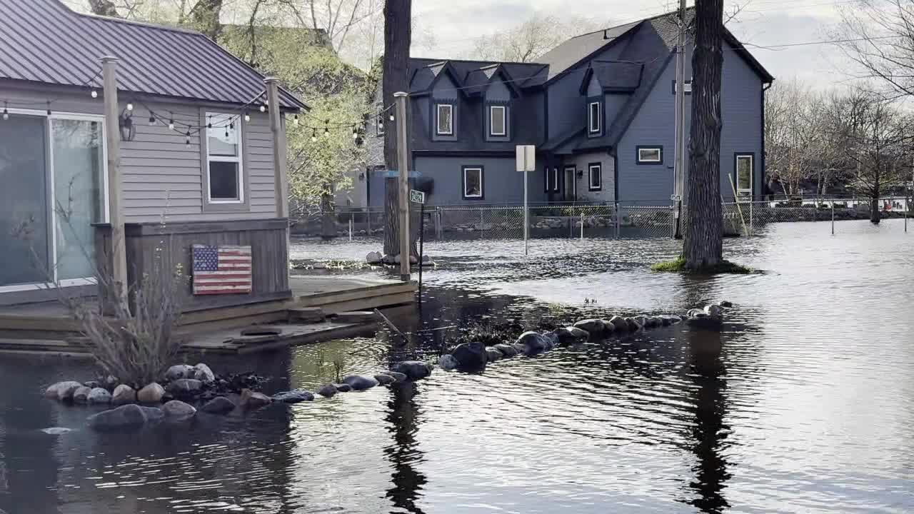 Summit flooding returns near lake; neighbors seek solutions