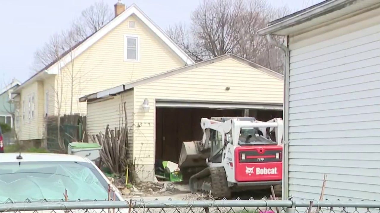 Milwaukee police scene near 15th and Hauser; garage searched
