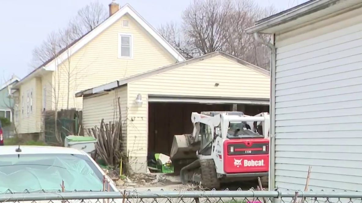 Milwaukee police scene near 15th and Hauser; garage searched