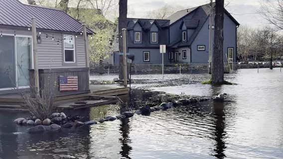 Summit flooding returns near lake; neighbors seek solutions