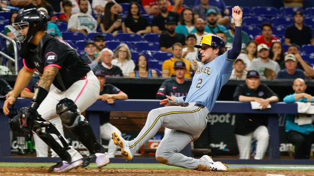 Brewers beat Marlins in extras, Mitchell's double the difference