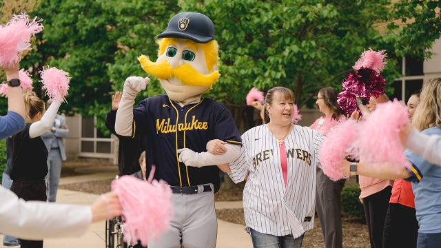 Brewers, Aurora surprise breast cancer survivor with spa day