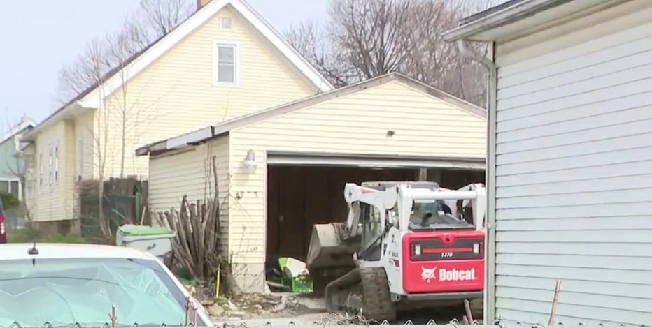 Milwaukee police scene near 15th and Hauser; garage searched
