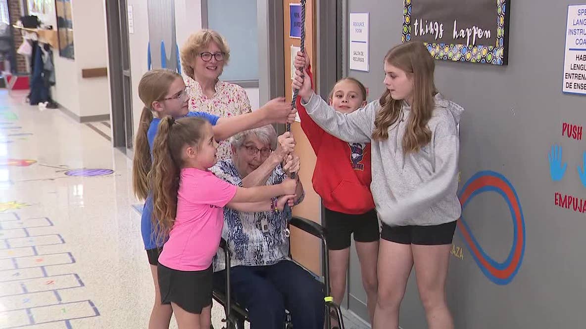 Former Waukesha teacher rings historic bell before school closes