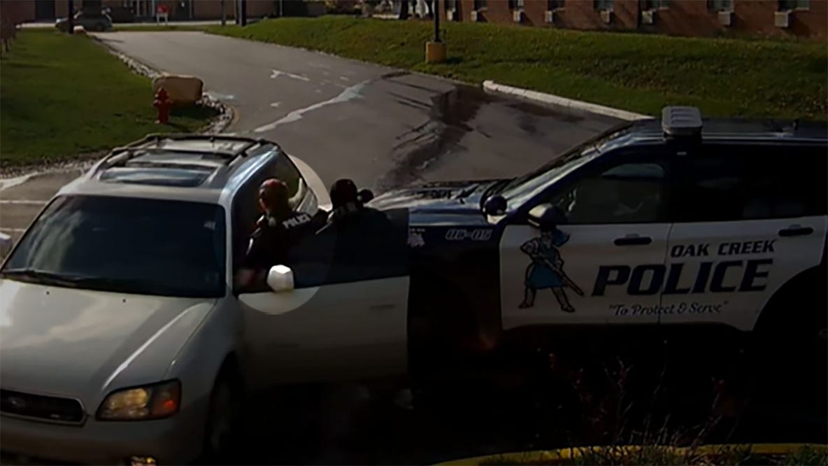 Video: Oak Creek police officer injured as fleeing suspect takes off