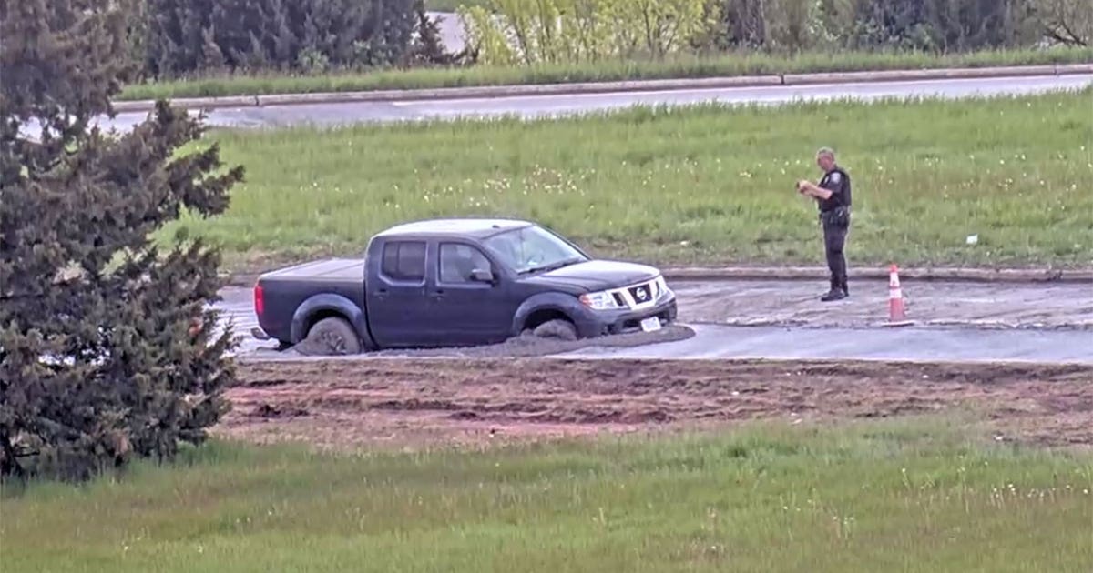 Wisconsin driver removes ‘road closed’ barrier; stuck in fresh concrete ...