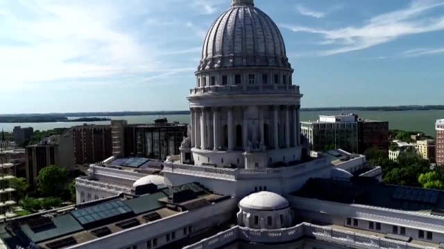 Wisconsin budget deal debate, finance committee advances proposal