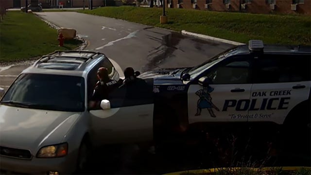 Video: Oak Creek police officer injured as fleeing suspect takes off