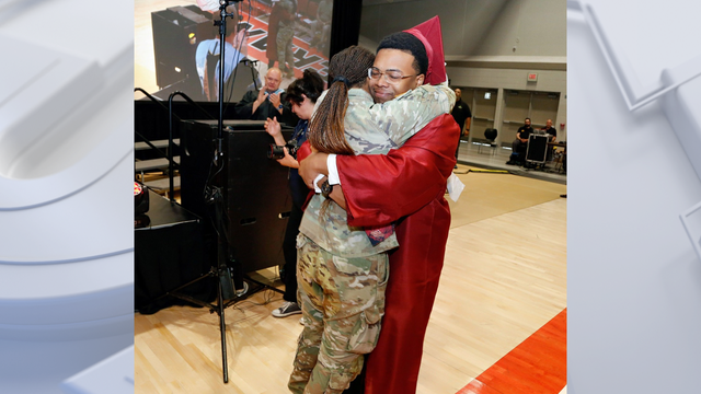 Milwaukee Lutheran grad surprised by deployed sister at ceremony