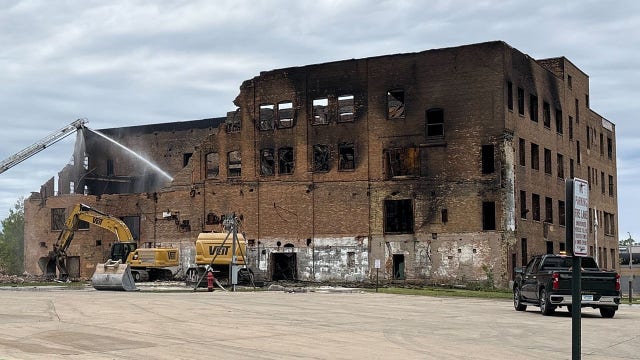 Milwaukee fire: Police arrest woman, building to be demolished