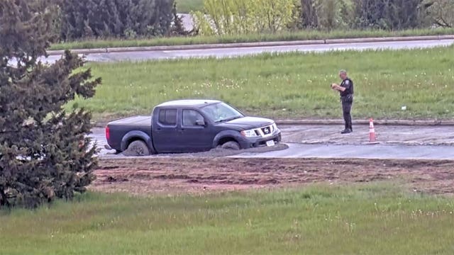 Wisconsin driver removes ‘road closed’ barrier; stuck in fresh concrete