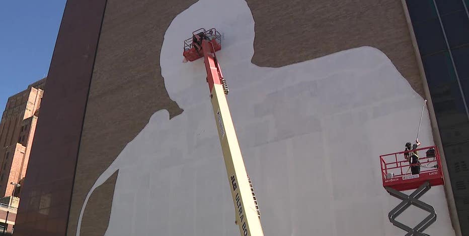 Downtown Milwaukee Bob Uecker mural being installed