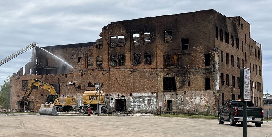 Milwaukee fire: Police arrest woman, building at risk of collapse