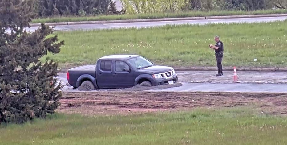 Wisconsin driver removes ‘road closed’ barrier; stuck in fresh concrete