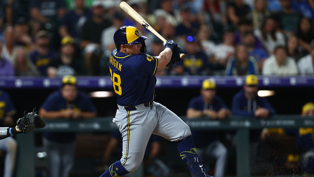 Brewers score 8 late runs, stun Rockies 9-7 in wild 10-inning victory