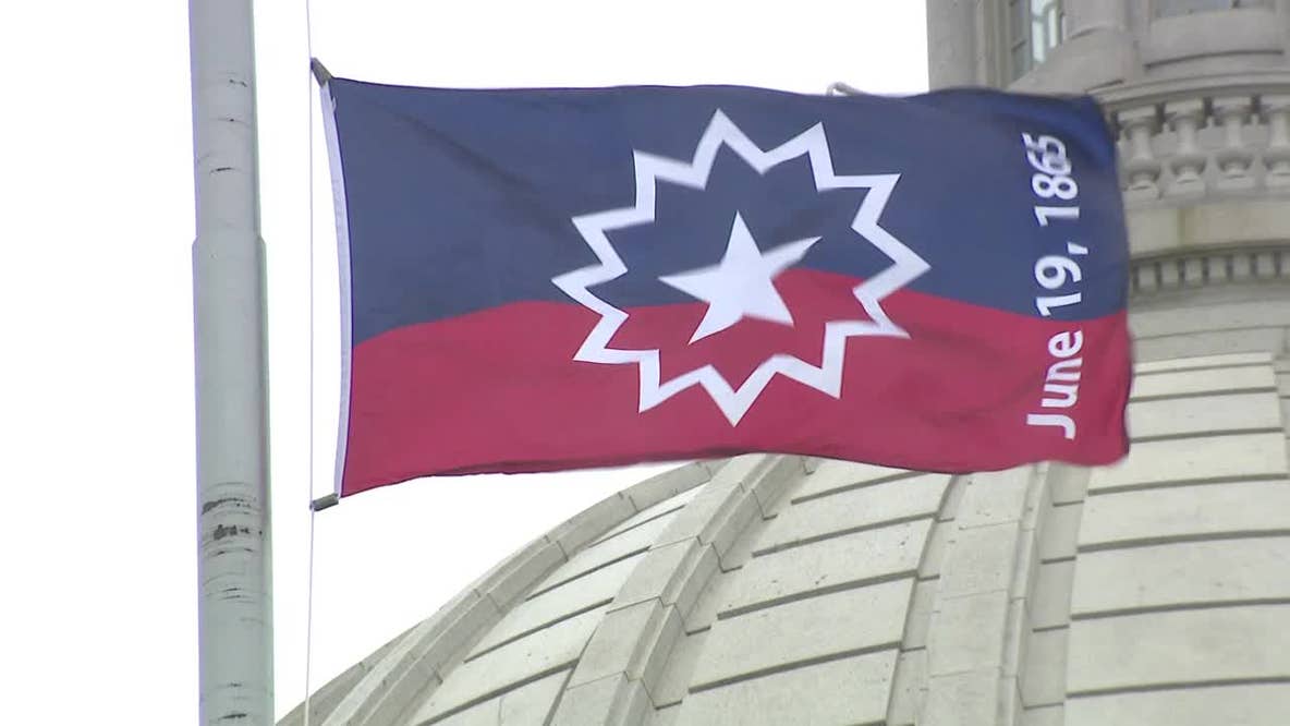 Wisconsin Juneteenth flag raised; paid holiday debate continues
