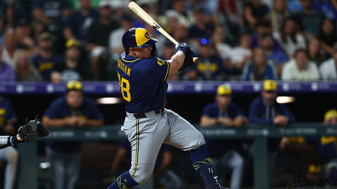 Brewers score 8 late runs, stun Rockies 9-7 in wild 10-inning victory