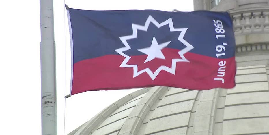 Wisconsin Juneteenth flag raised; paid holiday debate continues