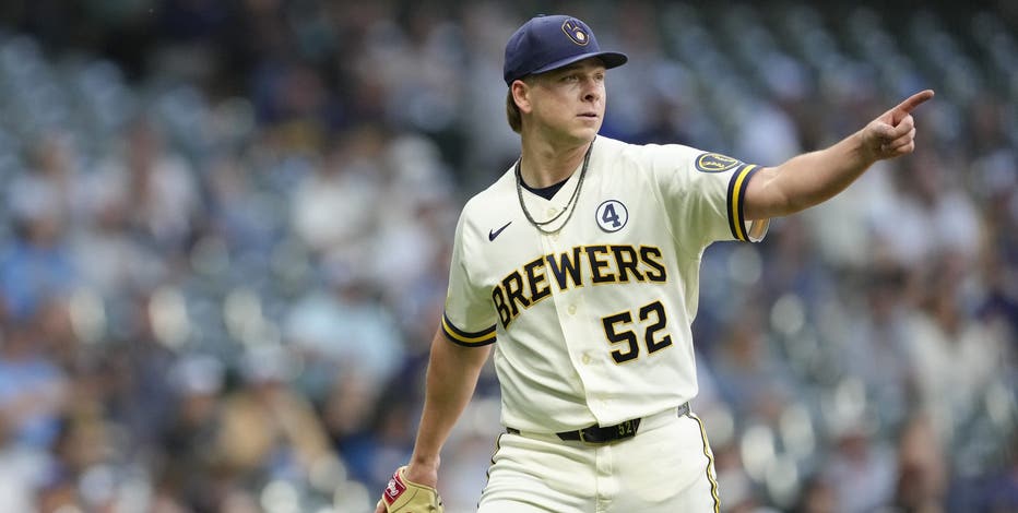 Brewers beat Giants; local artist's Barrelman hat takes spotlight