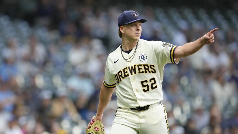 Brewers beat Giants; local artist's Barrelman hat takes spotlight