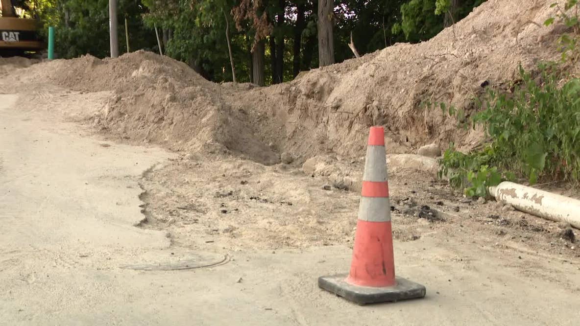 Elkhart Lake trench collapse rescue, worker buried up to his neck