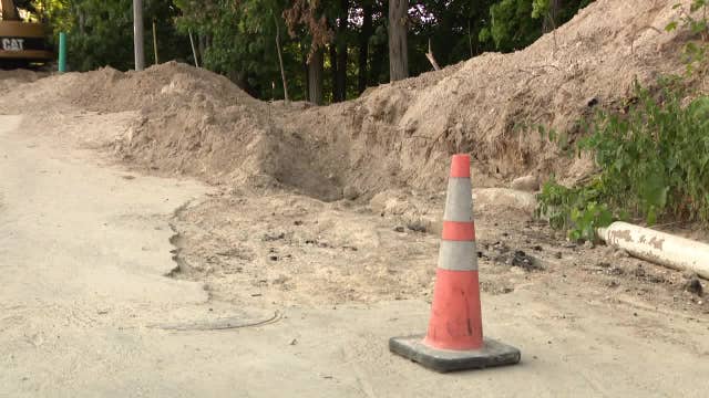 Elkhart Lake trench collapse rescue, worker buried up to his neck