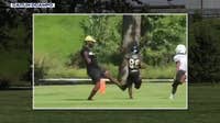 Parent trips Racine youth football player after rushing field