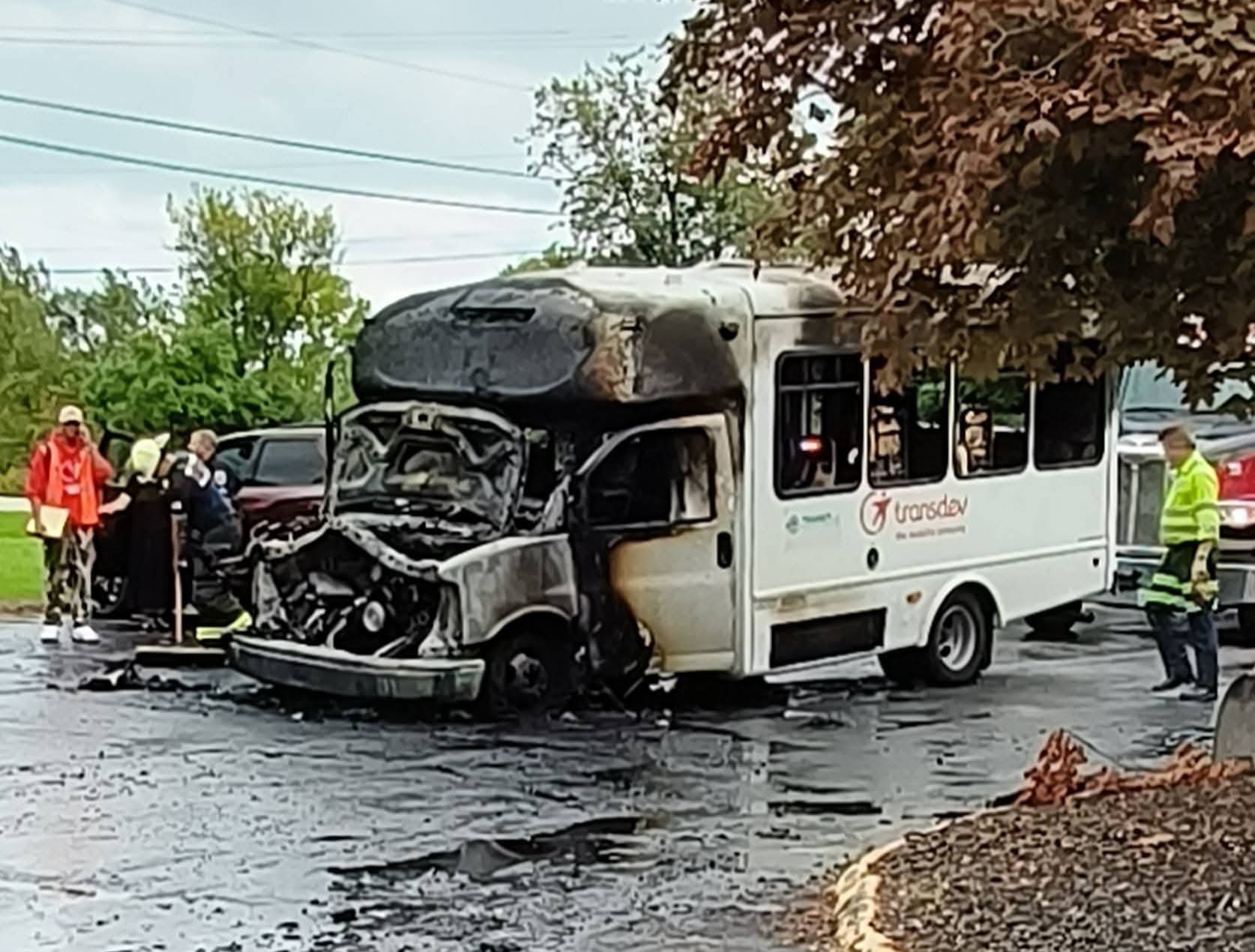 Oak Creek paratransit van fire, driver carries passenger to safety