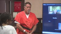 Franklin man accused of pointing gun at school employee during property dispute
