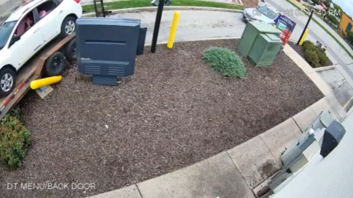 Watch: Driver towing vehicle crashes in Taco Bell drive-thru