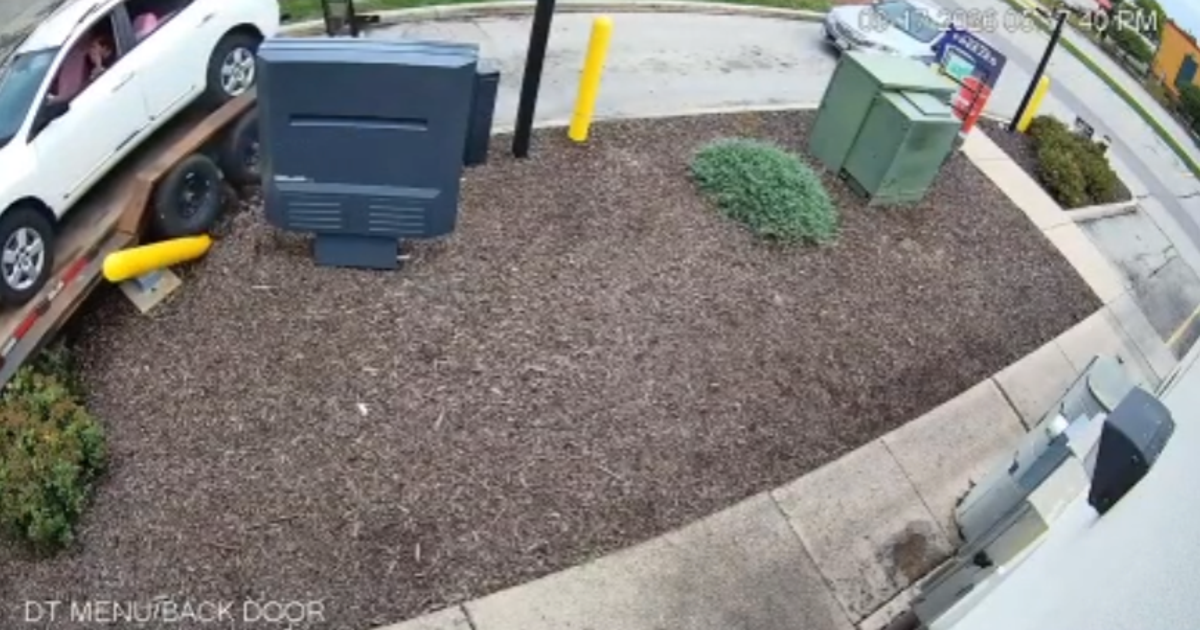 Watch: Driver towing vehicle crashes in Taco Bell drive-thru