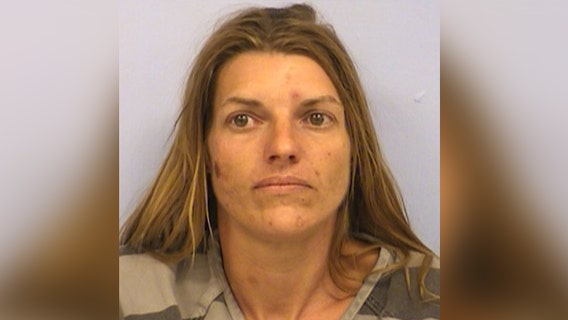 Woman arrested after being found living in shed with child