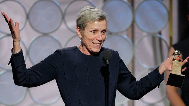 Oprah, 'Three Billboards' triumph at black-draped Globes