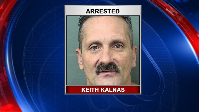 Police: Man crept into Walmart shopper's car, robbed driver at gunpoint