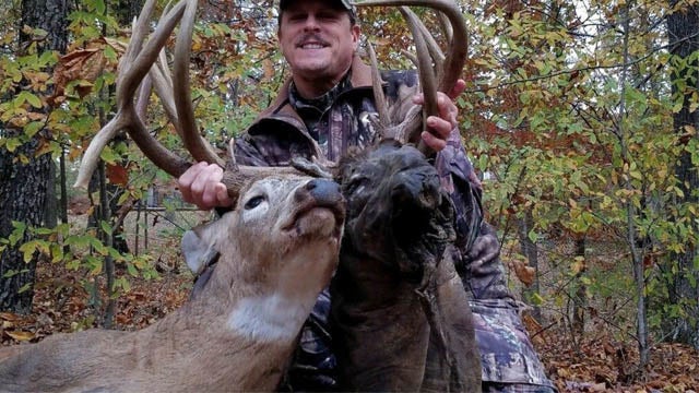 Kentucky man bags 'rare' deer with decapitated buck head entangled in its antlers