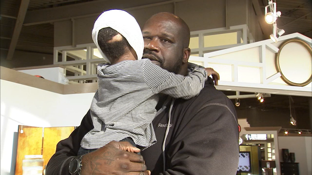 Shaq surprises dog attack victim