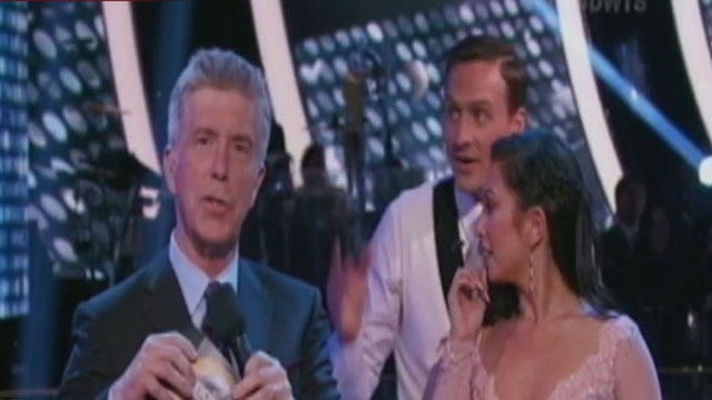 Ryan Lochte rushed on stage during live TV