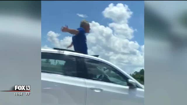 Off-duty deputy records Florida man standing in sunroof while traveling on I-4