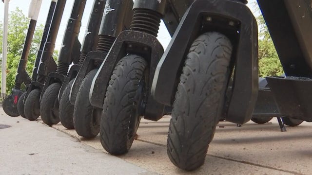 Person falls off scooter, struck by vehicle on E. Riverside Drive