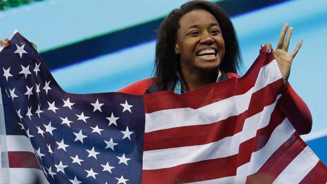 Simone Manuel becomes first African American woman to win swim gold