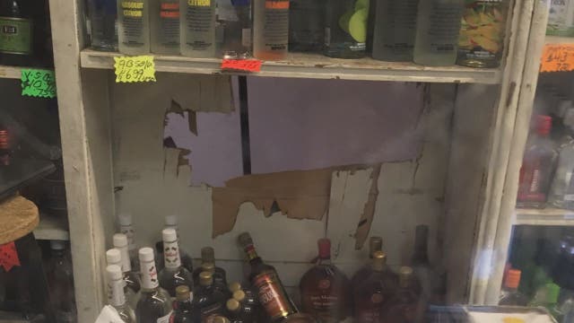 VIDEO: Burglar breaks into liquor store by cutting through wall