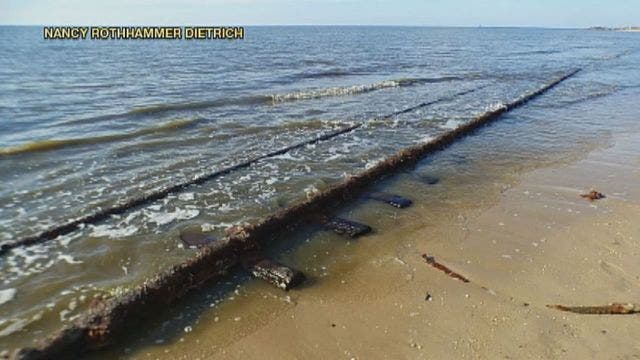 Century-old 'ghost' railroad tracks unearthed at New Jersey beach