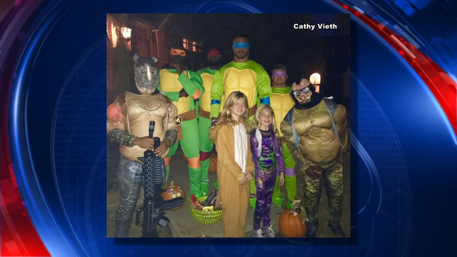 Cowboys star Dak Prescott passes out candy dressed as blue Ninja Turtle
