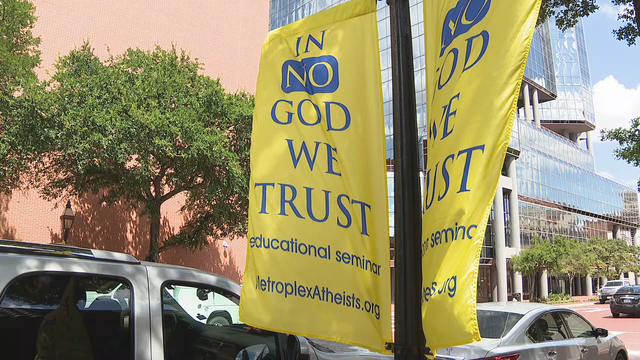 Atheist group's "In No God We Trust" banners stir controversy in Fort Worth