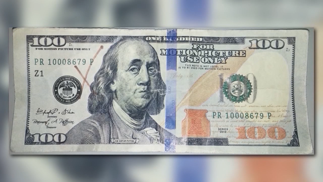 Employee accused of swapping movie money for real cash